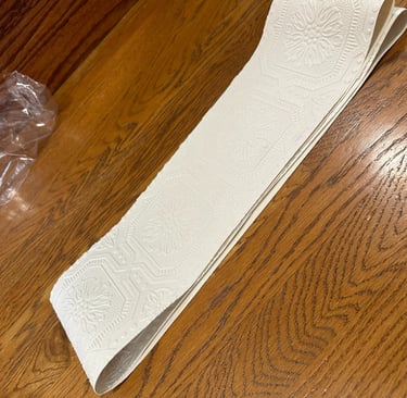 paintable-textured-wallpaper-roll-folded