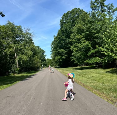 Stay at home mom - kids riding bikes on a slow morning