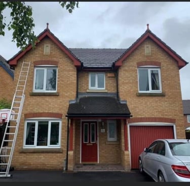 Roofing Specialist Yorkshire. A picture of the front of a house showing new roofing