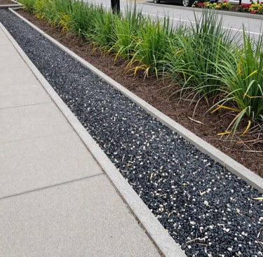 French drains, gravel trenches, permeable paths, rain‑friendly planting.