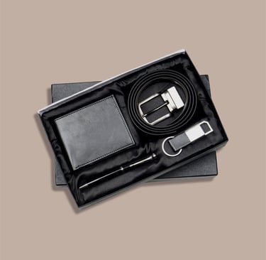 Premium corporate new joinee kit with a leather belt, matching wallet, and sleek pen.