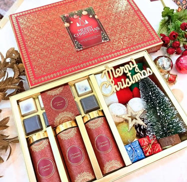 Gourmet food gift hampers with loose leaf tea and artisanal chocolates