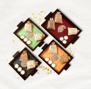 Corporate festive gifts hamper with elegant brass diya and premium treats