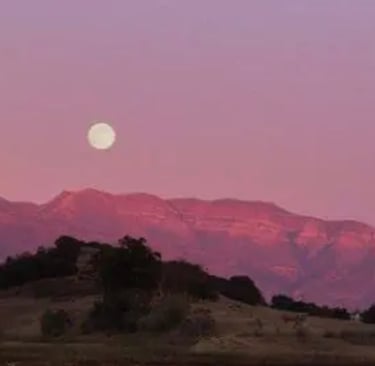 The Pink Moment casting a rosy glow over the Topatopa Mountains above the Ojai Valley at sunset