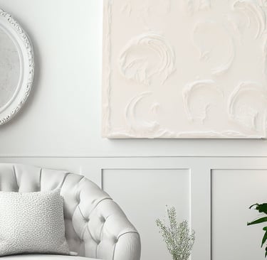 Textured sculptural wall art styled in luxury home staging project by interior designer.