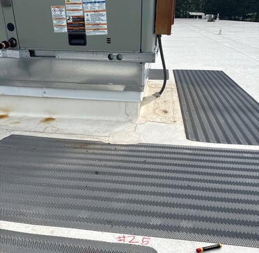 Forensic sequence showing a minor leak defect mark on a TPO walk pad