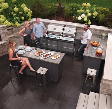 Friends enjoying a luxury napoleon Oasis outdoor kitchen