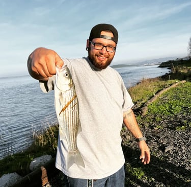 picture of sonoma junkers owner holding a fish