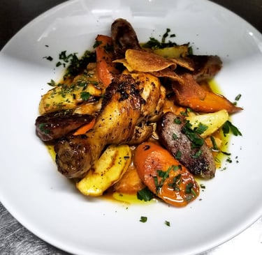 Beautiful plated roast chicken meal at Tonic Martinborough