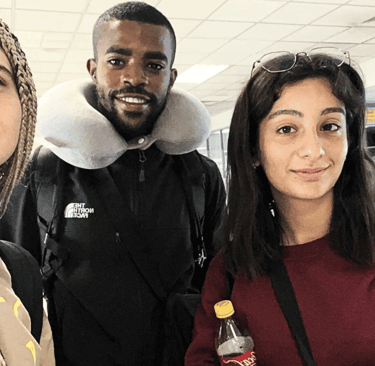 Group of happy tourists using Colombo Airport transfer service in Sri Lanka