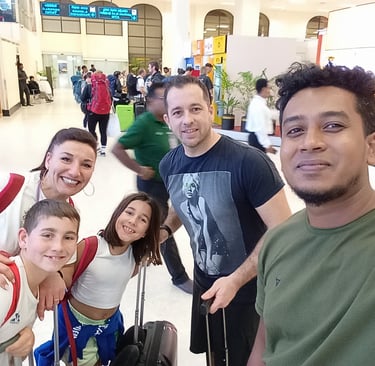 Family meeting their professional driver at Colombo Airport for a Sri Lanka tour.