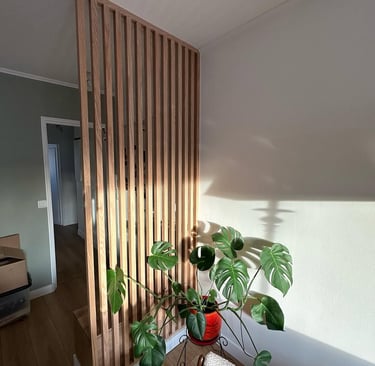 a planter with a plant in a room