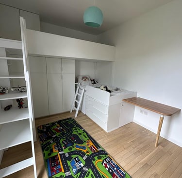 a room with a rug rug and a rug rug