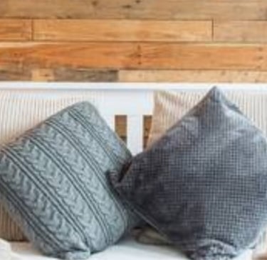 a bed with a white bed and pillows