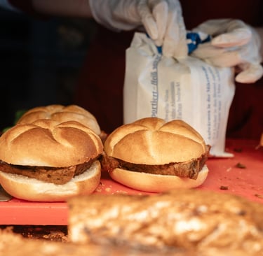 a bunch of sandwiches on a red tray