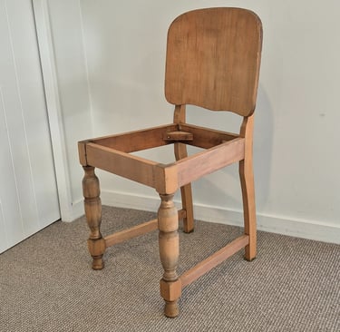Vintage wooden dining chair frame with turned legs and a solid backrest paint stripped by laser