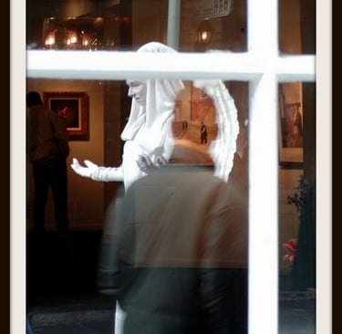 a man in a white shirt and a woman in a white dress