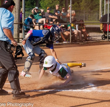 Baseball Player slides into home at Rineyville Ball Park. Photo by William Gore Photography