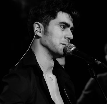 Brighton singer Olly Williams performing live music at venue