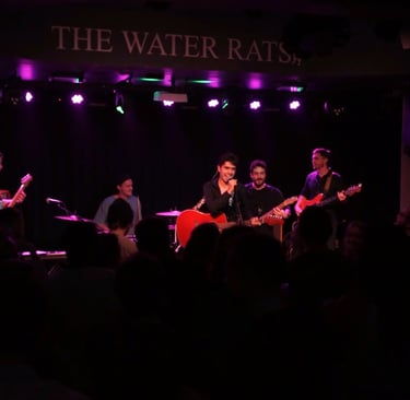 Olly Williams performing live with band at The Water Rats music venue London