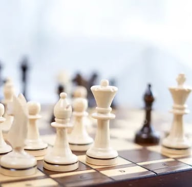 a chess game with chess pieces on a chess board