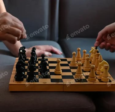 a man and woman playing chess in a living room