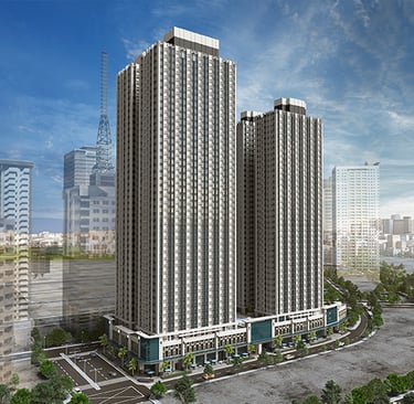 Modern twin-tower high-rise residential condominium building in a sunny urban cityscape.