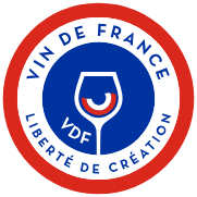 red, white and blue logo for wines of france with wine glass in a circle