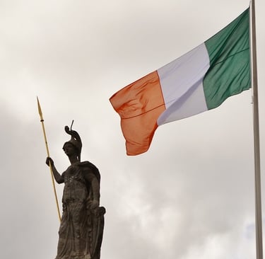 Statue of Hibernia at the GPO with the national flag beside it