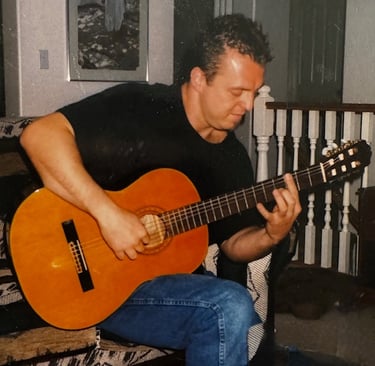 Playing for friends at a house party, 1998