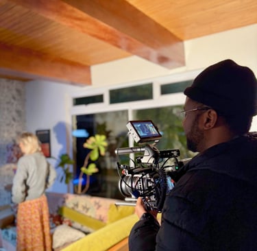 Daniel da Trindade filming behind the scenes during a music video shoot at Porch Time Records.