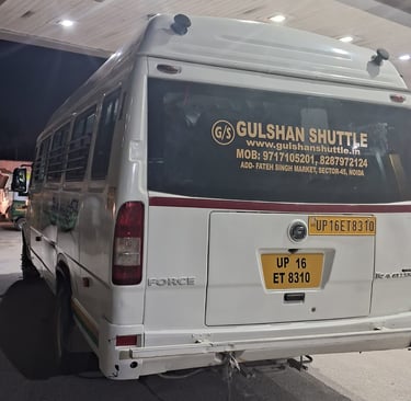 tempo traveller branded with gulshan shuttle transport service