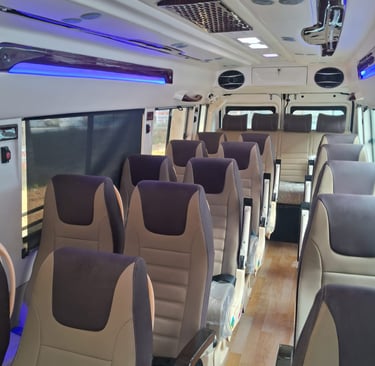 comfortable tempo traveller interior with pushback seats