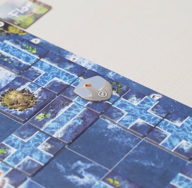 Ant žaidimo lentos padėtas paukščio žetonas