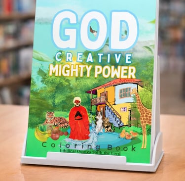 God Creative Mighty Power coloring book on a stand with biblical quotes and animal illustrations.