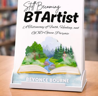 Still Becoming BTArtist book by Beyonce Bourne on a bookstore display stand.