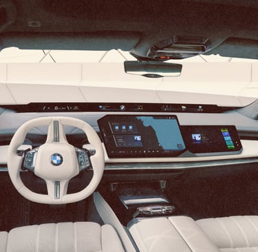 Modern luxury BMW interior featuring a curved digital dashboard display and white leather steering wheel.