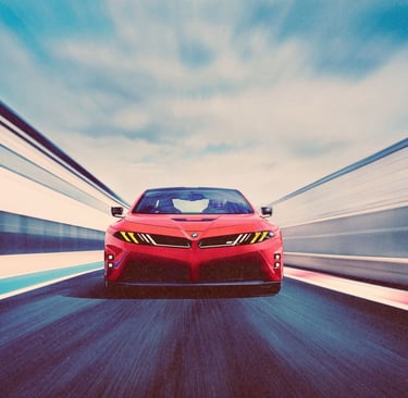 Red modern sports car driving fast on a race track with motion blur and yellow headlights.