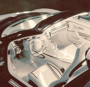 Overhead view of a custom white luxury sports car interior with black pinstripe detailing.