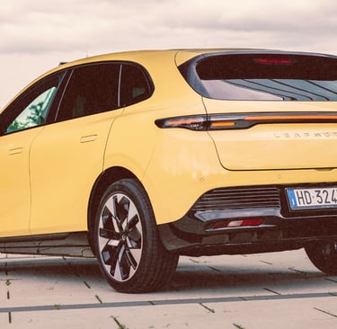 Yellow Leapmotor B05 electric SUV parked outdoors, showcasing modern rear design and sleek alloy wheels.