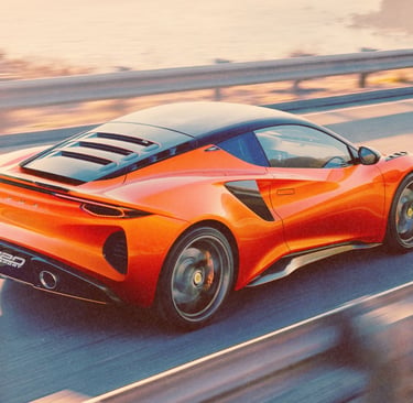 An orange Lotus Emira sports car driving on a scenic coastal highway at sunset.