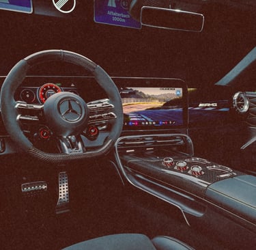 Luxury interior of a Mercedes-AMG sports car featuring a carbon fiber steering wheel and digital dashboard.