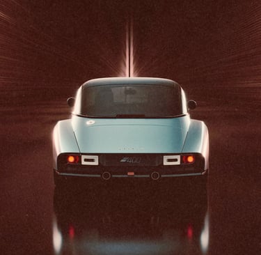 Rear view of a silver Morgan Supersports car driving through a high-speed motion blur tunnel.