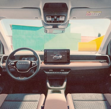 Modern interior of Skoda Epiq electric SUV featuring a digital cockpit and infotainment touchscreen