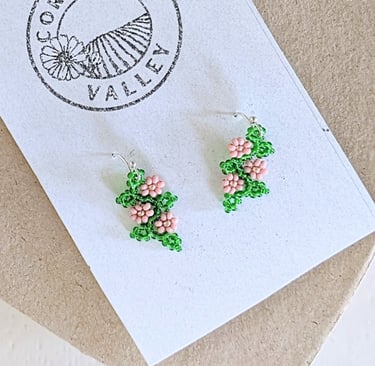 Beautifully hand beaded soft rose pink floral garland earrings made with Czech glass beads