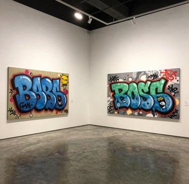 A serene black and white photograph hanging on a white gallery wall.