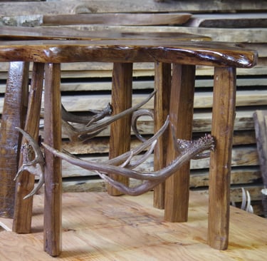 black walnut table with deer horns 