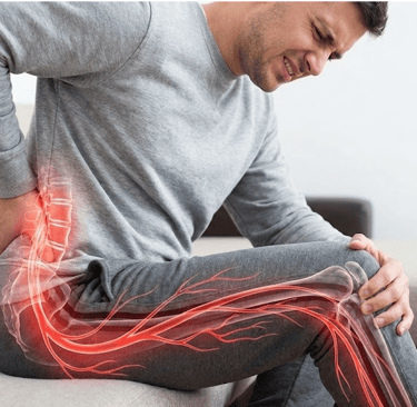 Person in pain with sciatica symptoms