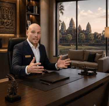alt="Angkor Herbal Solutions founder presenting free marketing templates from his office"