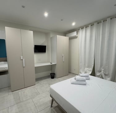 domus casa vacanze stanza da letto